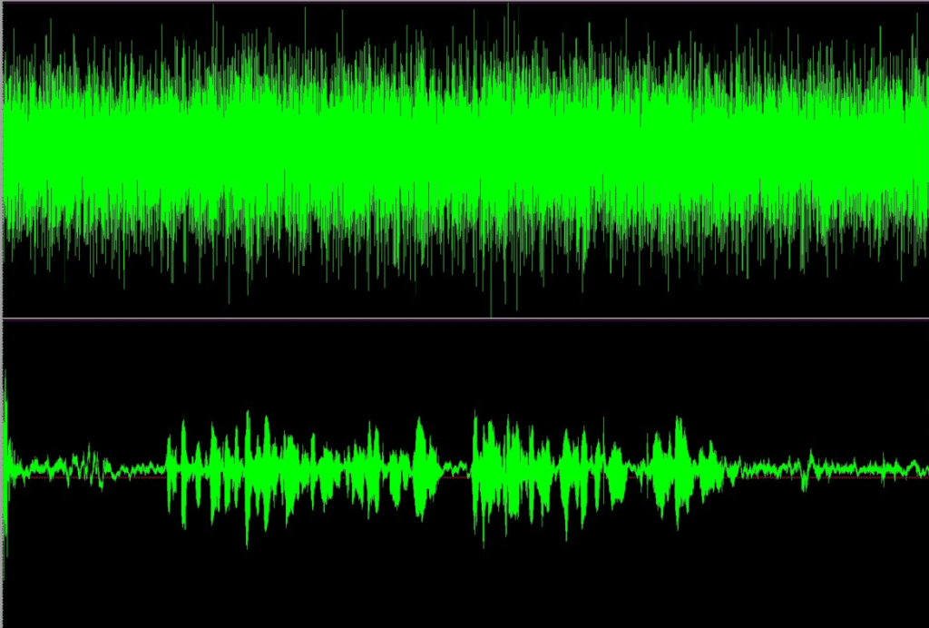 SNR improvement from noise cancelling microphone configuration